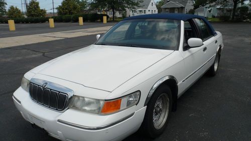 No reserve auction! highest bidder wins! check out this luxurious grand marquis!
