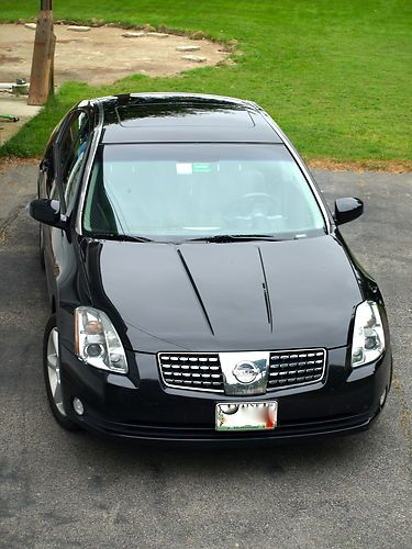 4 dr sedan.  black.  excellent condition.  all the bells &amp; whistles.