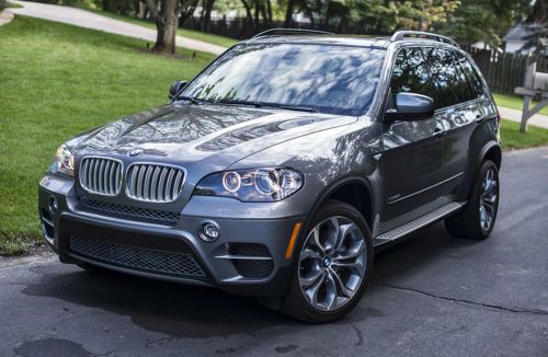 2011 bmw x5 xdrive 5.0i v8 sport package- msrp new $66,925 - only 5,350 miles!!