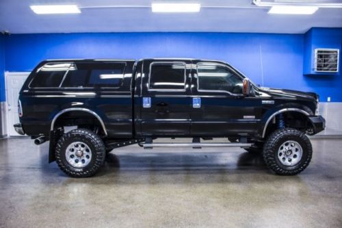 Lifted 6.0l powerstroke diesel crew cab running brds hard canopy leather sunroof