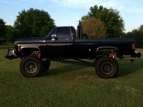 Chevy 4x4 lifted 2500 (3/4 ton) 454 4-speed manual transmission