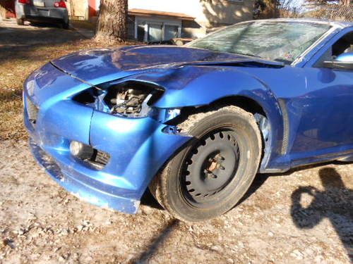 2004 rx-8 blue 6 speed manual has damage hit deer