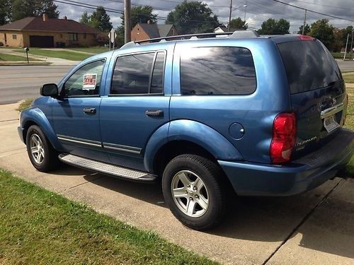 2004 dodge durango with 5.7 hemi three rows electric blue with new tires clean