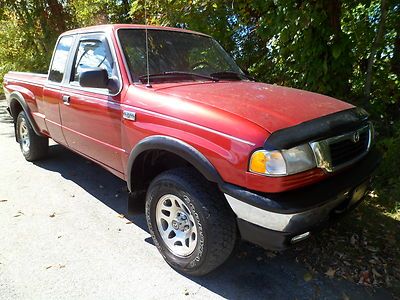1999 mazda b3000 4x4 3liter 6cylinder 4 doors with air conditioning