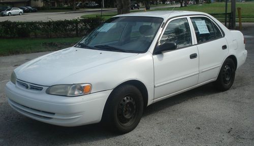 1998 white toyota corolla 4 door - clean / sony cd player / cold a/c