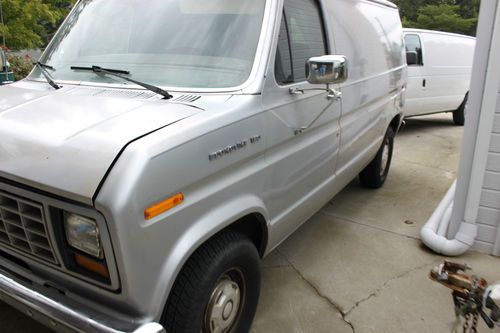 1986 silver, no windows except in the back, cargo van. great work van, runs good