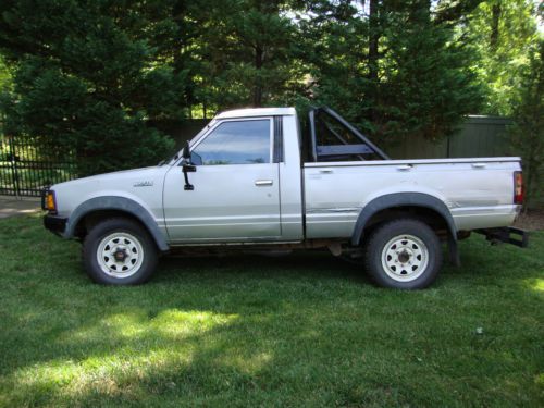 1984 2 door 4wd 5 speed manaul transmission nissan pickup truck 179,000 miles