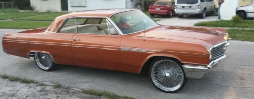 1964 buick lasabre 2 door coupe with 22 inch wires wheels