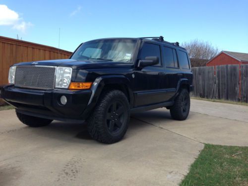 2006 jeep commander, 4x4, lifted, new tires, dvd