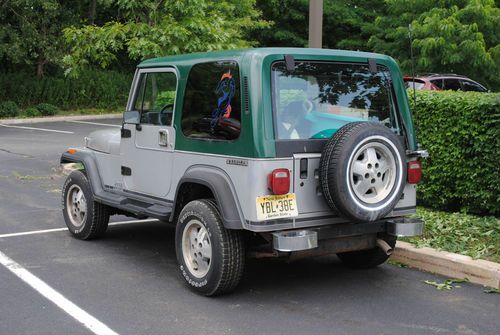 1989 jeep wrangler laredo, six cylinder, hard top and bikini top w toneau cover
