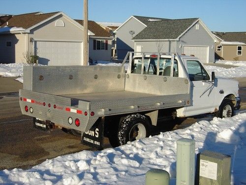1997 f350 xlt dually with 9' aluminum flatbed and tool box and new tires!