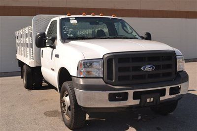 2005 ford f350 4x4 6.0l powerstroke diesel stake bed w/lift