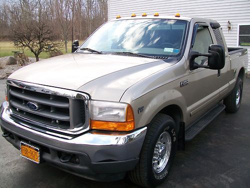 2001 f250 super duty extended cab 2x4  very low miles clean title no rust!