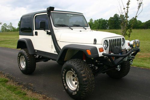 1999 jeep wrangler rock crawler  2-door 4.0l, 11 inch lift, air lockers, extras