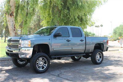 Lifted 1 owner 4x4 brand new lift, wheels and tires, dvd, navigation, leather