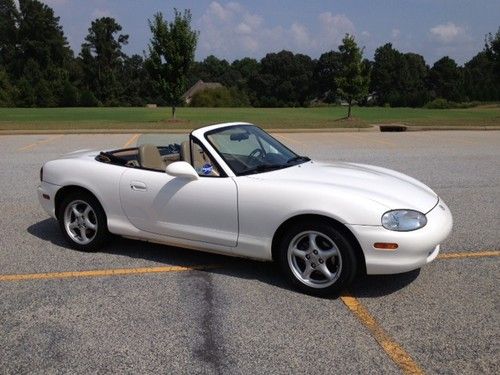 Convertable 5 speed leather bose system alloy rims white/tan top