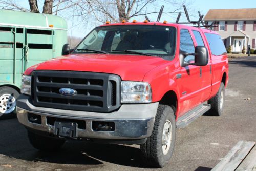 06 ford f250 sd truck, xlt  4 door, crew cab, diesel, 6 speed manual, 4x4  red
