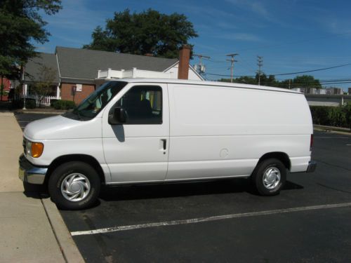 Ford e150 white work van 2003 low miliage and lots of bin storage great shape