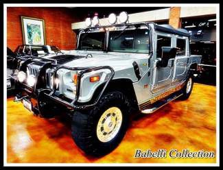 2002 hummer h1, 19k miles!, dvd players,carbon fiber and too many others to list