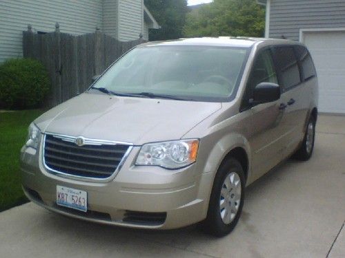 2008 town and country lx, metallic gold, excellent in and out condition
