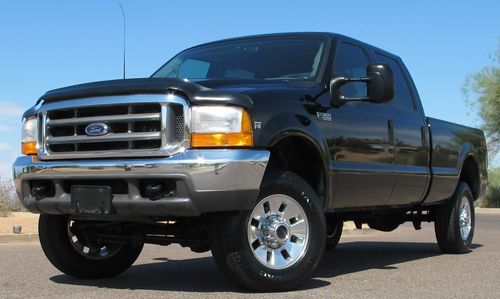 No reserve 1999 ford f350 7.3l diesel crew 4x4 xlt long bed low mile very clean