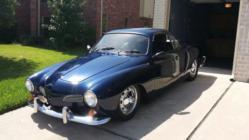 Beautiful blue color vw karmann ghia coupe with custom sound and interior