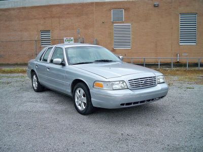 Lx sport. low mileage. center console shifter. leather. silver. cd stereo