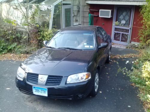 2004 black nissan sentra approx 40,000 miles - belonged to my mother