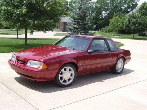 1993 mustang 5.0 lx electric red,gray interior aod 14,000 orig.miles