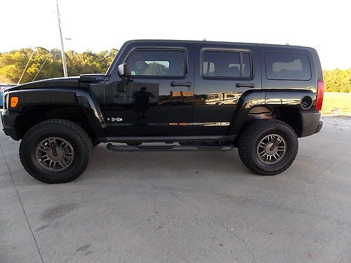 2006 hummer h3 blk on blk lot of $$$ in aftermarkets very sleek "video no reserv