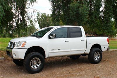 1 owner lifted crew cab 4x4 with new tires, fabtech lift, leather - we finance!