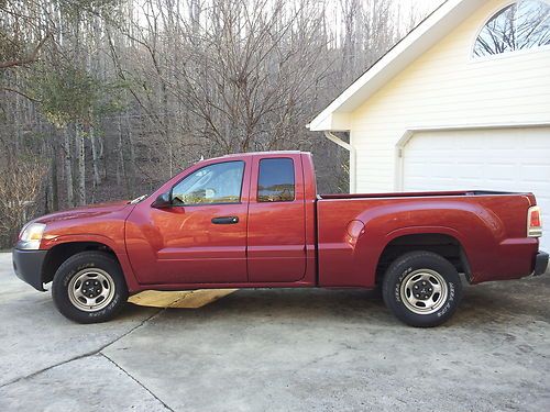 06 raider ext cab 35,000 miles clean and well kept truck - no reserve!!!!