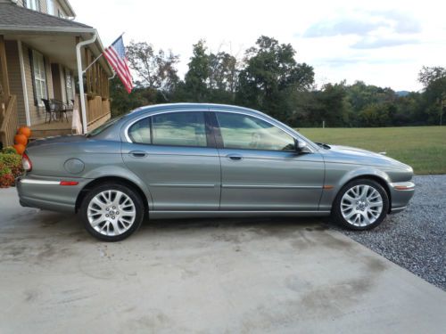 Very clean vehicle, gray with tan leather, sunroof..great condition