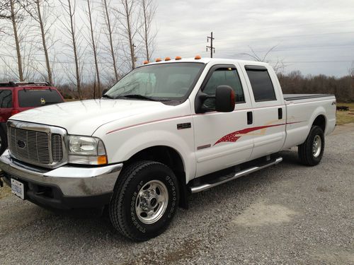 2003 ford lariat f250 superduty 4x4 4dr diesel with low miles lots new