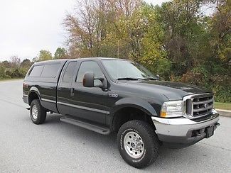 Ford f-250 extended cab long bed f250 low miles fx4 4x4 4wd runs great leer cap