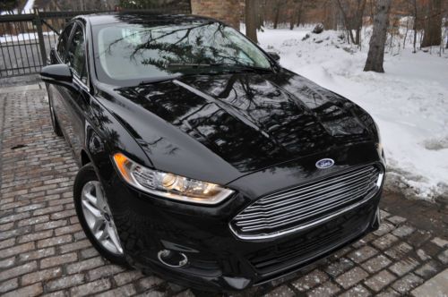 2013 fusion se.no reserve.1.6 l turbo/leather/heated/fogs/sync/salvage/rebuilt