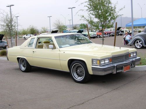 Cadillac  1978  3 x yellow coupe de ville