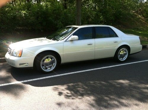 2002 cadillac deville dhs vogue tires...like new!!! pearl white