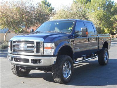 Powerstroke lifted f250 4x4 badboy supercrew with only 52000 miles