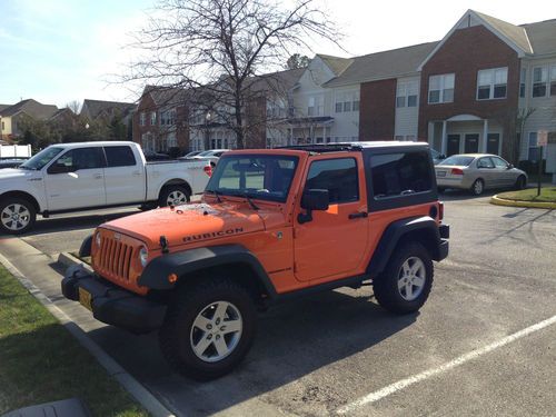 Just like new jeep rubicon 6 speed, never off road, 30 months of warranty left