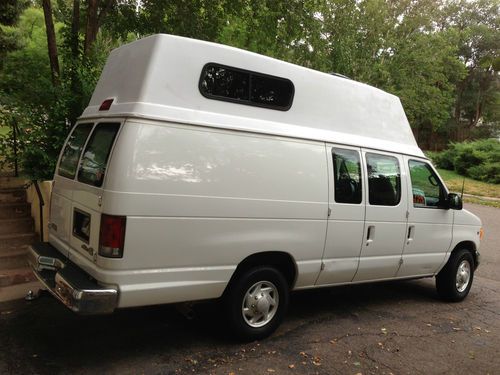 2001 custom camper/work,  6'6" inside standing,white e-350, great condition,
