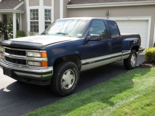 1994 chevy automatic, 4 wheel drive, new engine w/ 25k miles, truck 142k miles
