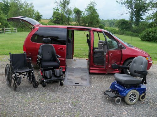 Handicap van with three wheel chairs, jazzy 600,jazzy 1100 and one manual