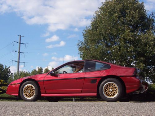 Near flawless 1988 fiero gt 5-speed highly documented low miles show and go!!