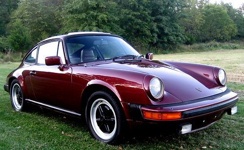1983 911sc sunroof coupe,ruby red metallic/red ,31k orig. miles,5 spd,ac,pw,exc.