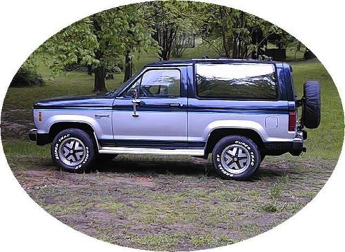 1987 dark blue &amp; silver ford bronco ii w/light blue striping