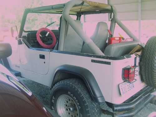 1991 jeep wrangler s sport utility 2-door 2.5l with 82,000 a miles