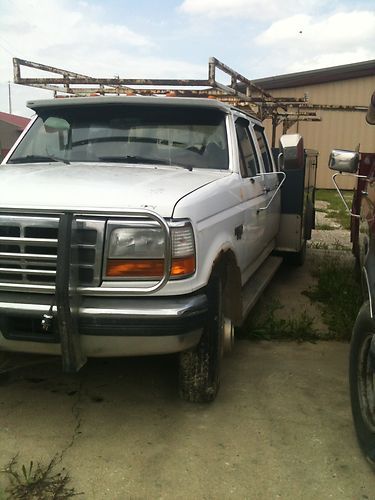Crewcab dually with 9' utility bed and rack