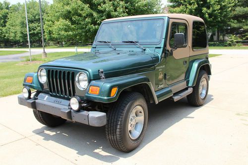 2000 jeep wrangler *low miles*manual,sahara model./with air conditioning.
