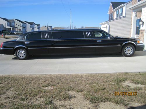 Limousine 100&#034; 8pac. 4 doors, black on black, chrome wheels.